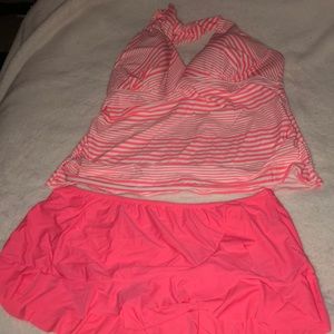 Woman’s two piece tankini top and bottom skirt